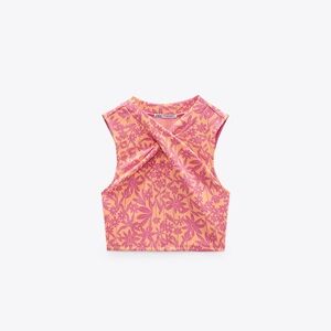 JACQUARD WRAP TOP
PINKS AND FLARED JACQUARD PANTS
PINKS